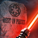 A red lightsaber jutting out of the ground from a grave that has the Empire's symbol on it and the words "Rest in pieces.".